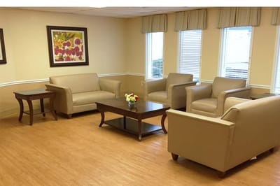 Bright common area with seating and decor