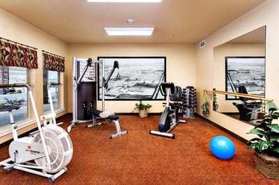 Interior view of a gym with exercise equipment