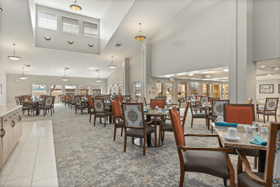 Bright dining area with tables set for meals