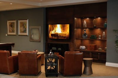 Cozy common area with seating and a fireplace