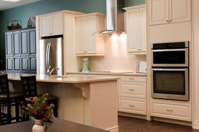 Modern kitchen interior with white cabinets and appliances