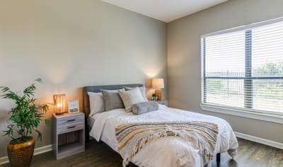 Cozy private bedroom with natural light