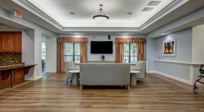 Bright common area with comfortable seating and natural light