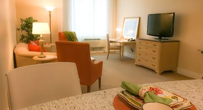 Cozy living area in a resident's room