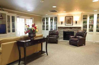Interior common area with comfortable seating and a fireplace