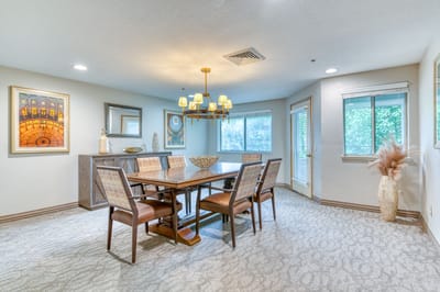 Dining area with a wooden table and chairs