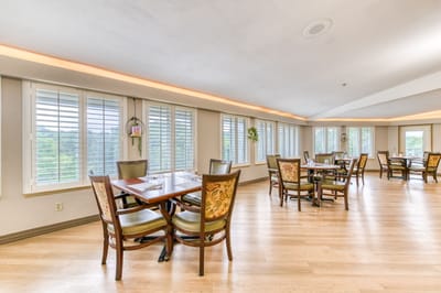 Interior dining room with wooden tables and chairs