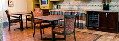 Bright common area with tables and chairs