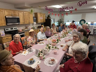 Residents enjoying a Mother's Day celebration in the dining area