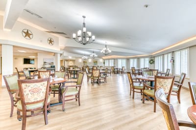 Bright dining room with wooden tables and chairs