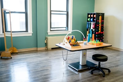Bright activity room with exercise equipment