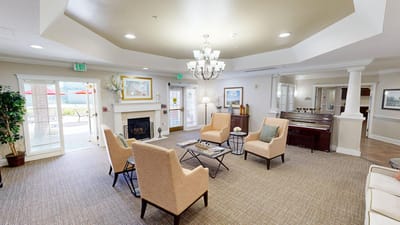 Cozy interior lounge with comfortable seating and a fireplace