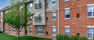 Exterior view of the facility with landscaping