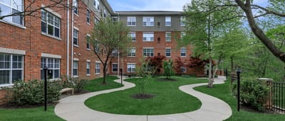 Beautifully landscaped outdoor courtyard with walking paths