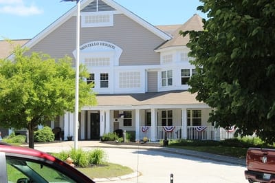 Exterior view of Montello Manor's building with landscaping