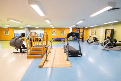 Interior view of a rehabilitation gym with equipment