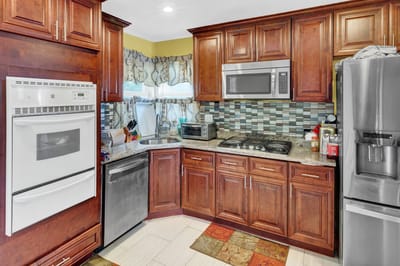 Bright, modern kitchen with wooden cabinets