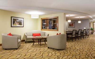 Bright common area with seating and decor