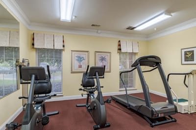 Interior view of a fitness room with exercise equipment