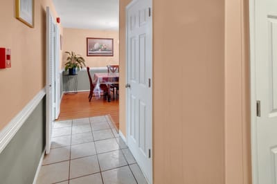 Hallway leading to a dining area