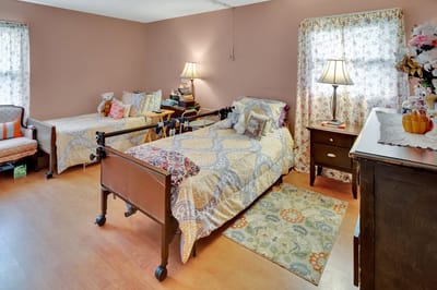 Interior view of a resident's room with two beds