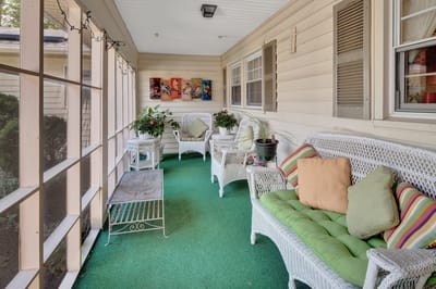 Cozy outdoor patio with seating and plants