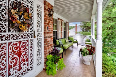 Welcoming porch with seating and decorative elements