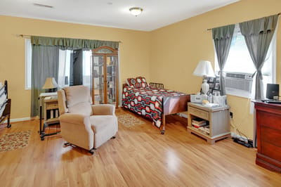 Cozy resident room with furniture and decor