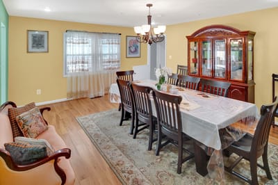 Bright and inviting dining area with wooden furniture
