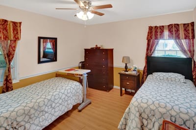 A cozy interior view of a shared resident room