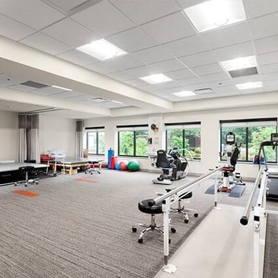 Interior view of a rehabilitation gym with exercise equipment