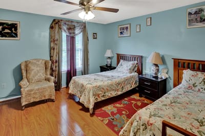 Cozy double room with floral bedding and decor