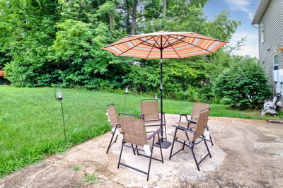 Outdoor seating area with an umbrella in a garden