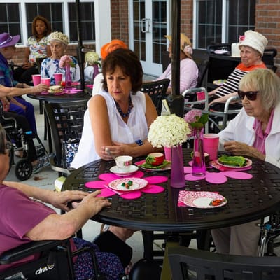 Residents enjoying a tea party outside