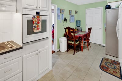 Bright kitchen area with dining table and chairs