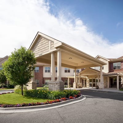Front entrance of Pomeroy Living of Sterling with landscaping