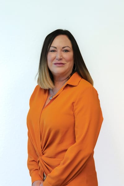 Staff member posing in a professional setting