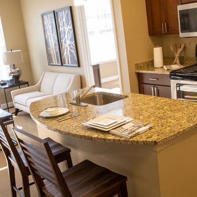 Bright living space with kitchen area and seating