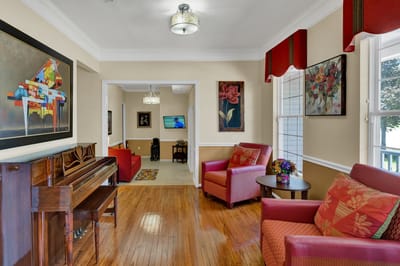 Bright interior common area with seating and decor