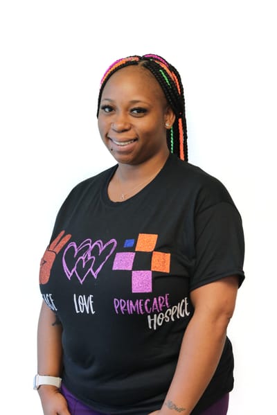 Staff member wearing a Prime Care Hospice shirt