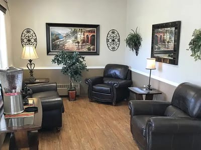 Cozy common area with seating and artwork