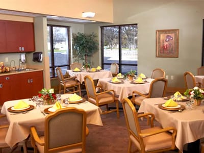 Dining room with neatly set tables