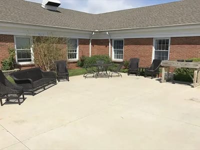 Outdoor seating area with chairs and table