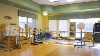 Bright activity room with equipment and seating