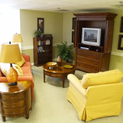 Comfortable lounge area with seating and TV