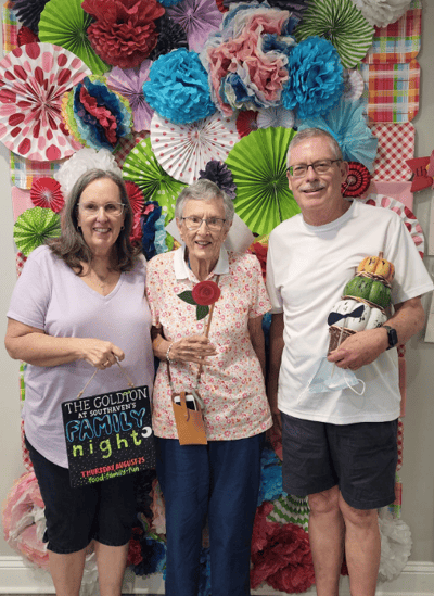 Residents and staff celebrating Family Night together