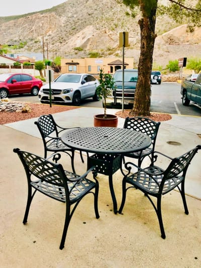 Outdoor seating area with chairs and a table
