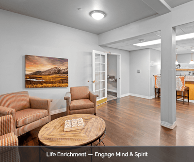 Bright common area with seating and artwork