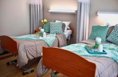 Interior view of a shared resident room with two beds
