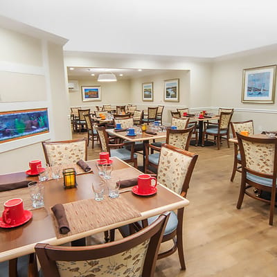 Dining area with tables set for meals
